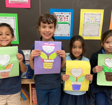 Cover photo of the 1st Graders show how Kindness Grows album